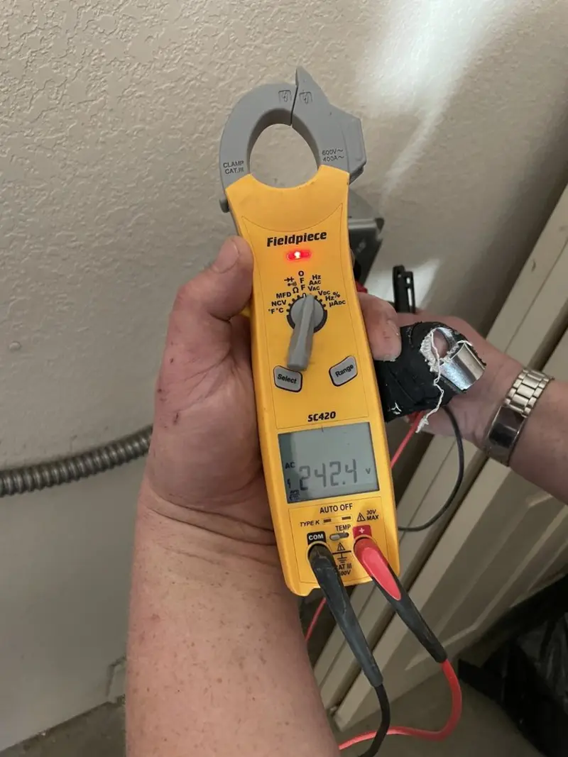 Voltage testing with clamp meter during Electrical Installation Services in Wytheville